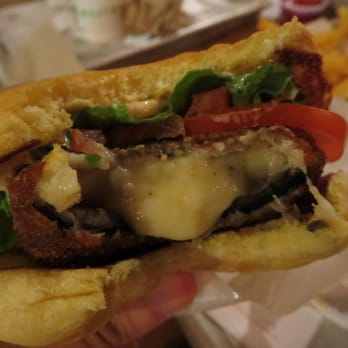 Shake Shack Buckhead - Cross section of 'Shroom Burger patty. Melted muenster and cheddar cheeses inside, along with Portobello mushroom. - Burgers Near Me - Atlanta, Georgia Shake Shack Buckhead - Cross section of 'Shroom Burger patty. Melted muenster and cheddar cheeses inside, along with Portobello mushroom. - Burgers Near Me - Atlanta, Georgia