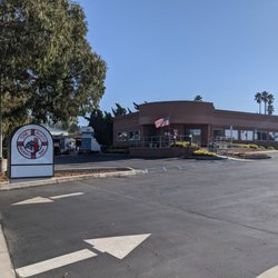 The Buoy Bar - Sign, building and parking lot