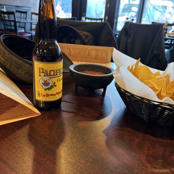 Taqueria La Monarca - a bottle of beer and a basket of chips - Mexican Near Me - Ashland, Wisconsin Taqueria La Monarca - a bottle of beer and a basket of chips - Mexican Near Me - Ashland, Wisconsin