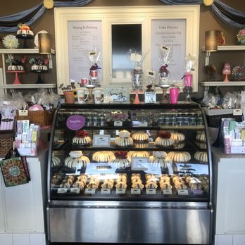 Nothing Bundt Cakes - Display / February 2018 / dozen mini bundts for $20.50 (tax included) - Bakeries Near Me - Manhattan Beach, California Nothing Bundt Cakes - Display / February 2018 / dozen mini bundts for $20.50 (tax included) - Bakeries Near Me - Manhattan Beach, California