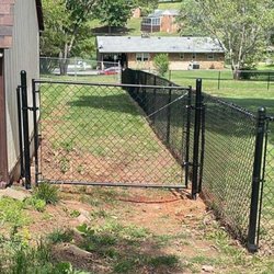 Cooper's 1 Call Does All - Front of the fence/gate. The old fence was aligned with the shed.