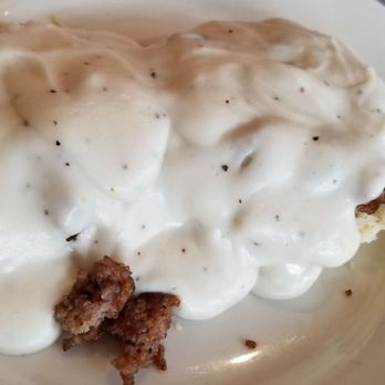 Lancaster's - Biscuit layered with sausage and gravy...$3.99 including coffee for seniors! - American Near Me - Ocean Springs, Mississippi