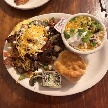 Brother Juniper's - Sand died an open face omelet and loaded cheese grits - Breakfast & Brunch Near Me - Memphis, Tennessee Brother Juniper's - Sand died an open face omelet and loaded cheese grits - Breakfast & Brunch Near Me - Memphis, Tennessee