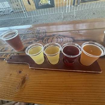 Dell'Osso Family Farm - Twisted Tea on tap, Hard Cider Flight, left to right -- Passion fruit cider, mango cider, moon berry cider, and apple cider! - Pumpkin Patches Near Me - Lathrop, California Dell'Osso Family Farm - Twisted Tea on tap, Hard Cider Flight, left to right -- Passion fruit cider, mango cider, moon berry cider, and apple cider! - Pumpkin Patches Near Me - Lathrop, California