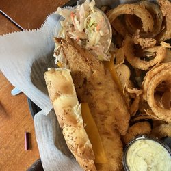 Local 438 Grille & Sport - Fried fish sub . Subbed onion rings.