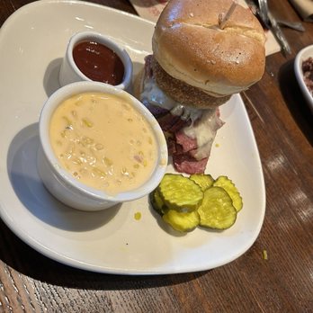 Jack Stack Barbecue - Freight House - Brisket and sausage sandwich with cheese corn side and sweet pickles - Barbeque Near Me - Kansas City, Missouri