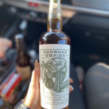 Still House Wines & Spirits - a hand holding a bottle - Beer, Wine & Spirits Near Me - Covina, California Still House Wines & Spirits - a hand holding a bottle - Beer, Wine & Spirits Near Me - Covina, California