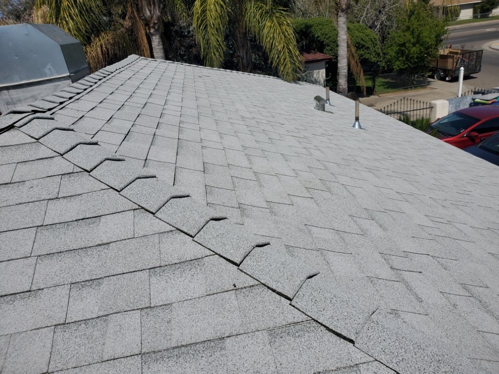 Slide of Hi-Tech Roofing Services