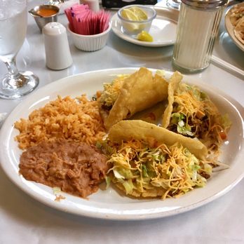 Rochas El Catan Grill - Puffy tacos with beans and rice. A little bland and a little strange but not horrible - American Near Me - Laredo, Texas