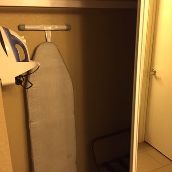 Hotel Avisa - Closet with sliding doors and ironing needs - Hotels Near Me - Morro Bay, California Hotel Avisa - Closet with sliding doors and ironing needs - Hotels Near Me - Morro Bay, California