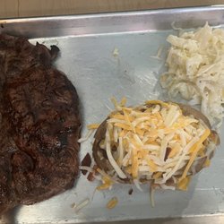 Hog House - Ribeye steak, fully loaded, baked potato and coleslaw