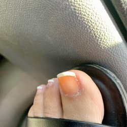 Aqua Nails & Salon - Horrible I'll looking acrylic tint.  Horrible pedicure