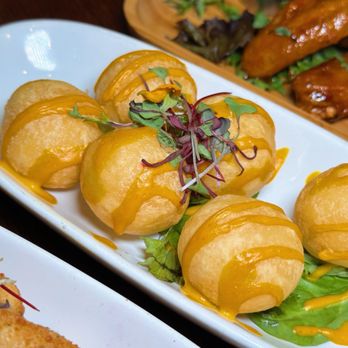 Muse Bar + Bistro - a variety of appetizers - New American Near Me - Clermont, Florida Muse Bar + Bistro - a variety of appetizers - New American Near Me - Clermont, Florida