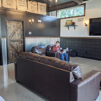 Millersport Coffee - a man sitting on a couch in a coffeehouse - Coffee & Tea Near Me - Millersport, Ohio Millersport Coffee - a man sitting on a couch in a coffeehouse - Coffee & Tea Near Me - Millersport, Ohio