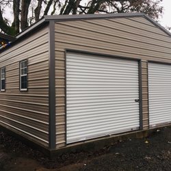 Itiel's Carports & Metal Buildings - 14 ga Vertical 24'x25'x10' fully enclosed, 4-windows,  2-10x8 roll up doors, vapors barrier on all building.