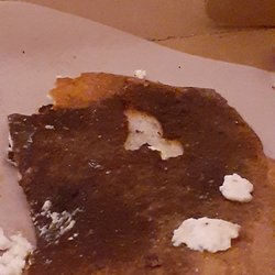 Angelina's Pizzeria - Bottom crust (I peeled away a couple pieces to show contrast on how much it was burnt.