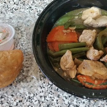 Honey's Thai Pavilion - Thai basil chicken with a side of curry puff. - Thai Near Me - Bronx, New York