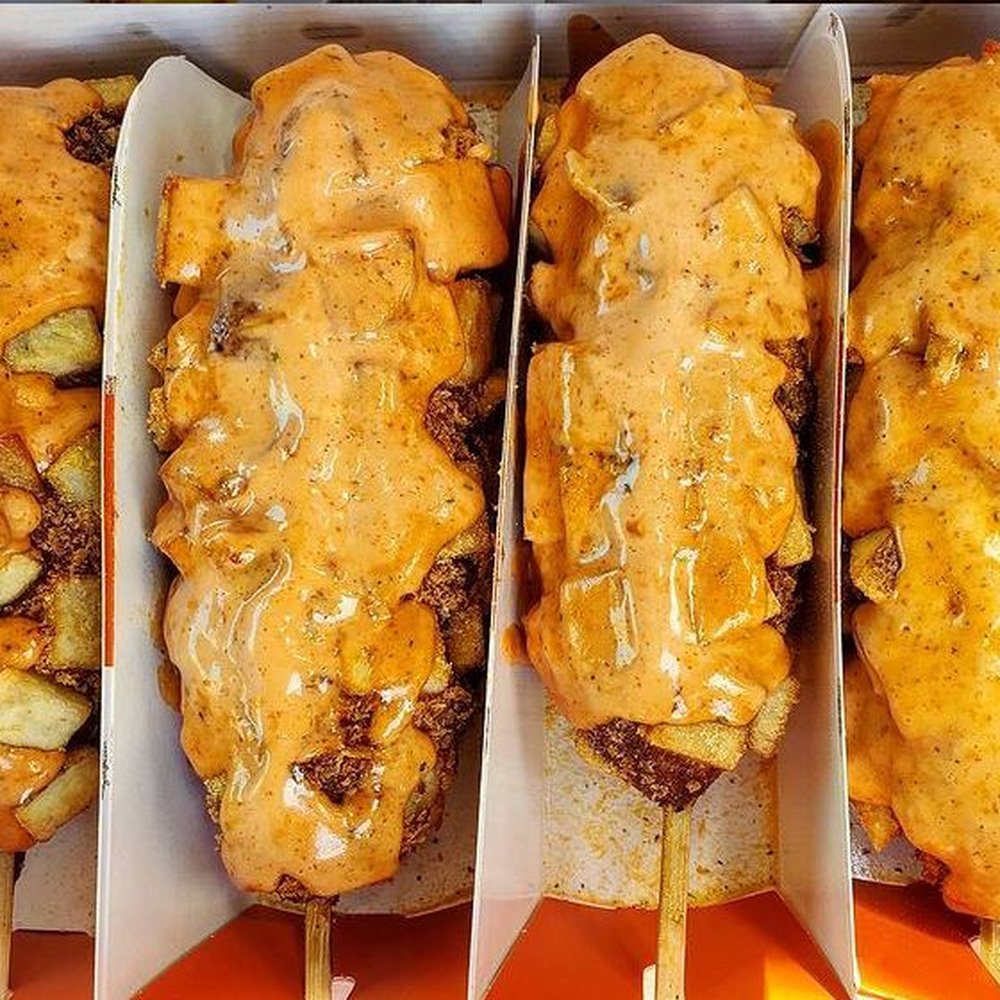 Potato Dog with their special dirty sauce