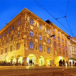 Sporgasse - Sporgasse Graz vom Hauptplatz aus gesehen am Abend mit den Luegg-Häusern