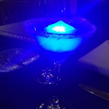 Narcoossee's - Island rum drink with a light up ice cube - New American Near Me - Lake Buena Vista, Florida Narcoossee's - Island rum drink with a light up ice cube - New American Near Me - Lake Buena Vista, Florida