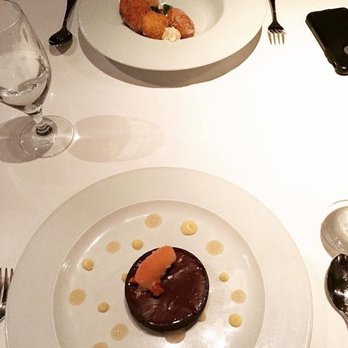Opus Restaurant - Salted caramel chocolate tart with sponge toffee and pop rocks - Wine Bars Near Me - Toronto, Ontario Opus Restaurant - Salted caramel chocolate tart with sponge toffee and pop rocks - Wine Bars Near Me - Toronto, Ontario