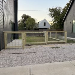 Secure Fence Solutions - Wood-framed hog wire fence