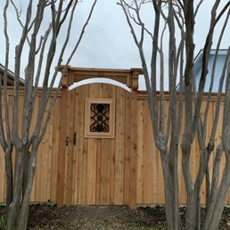 Decorative Gate on a 6 ft fence. Such great craftsmanship. Decorative Gate on a 6 ft fence. Such great craftsmanship.