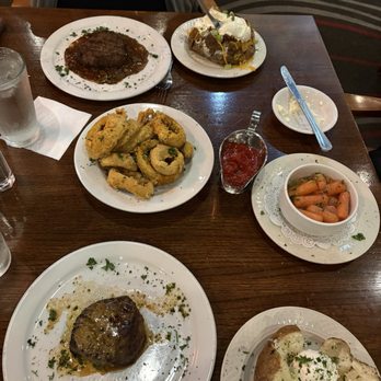Carmine's Steakhouse - Two filet mignon's two baked potatoes, fully loaded, Dre, onion rings and order of their carrots - Steakhouses Near Me - Saint Louis, Missouri Carmine's Steakhouse - Two filet mignon's two baked potatoes, fully loaded, Dre, onion rings and order of their carrots - Steakhouses Near Me - Saint Louis, Missouri
