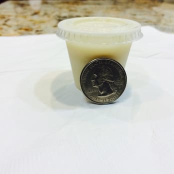 Mumbai Chowk - Rabdi Kulfi -Used a quarter to show the scale and size of the container. This costs whopping $4. - Indian Near Me - Newark, California Mumbai Chowk - Rabdi Kulfi -Used a quarter to show the scale and size of the container. This costs whopping $4. - Indian Near Me - Newark, California