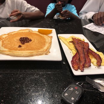 Keke's Breakfast Cafe - Create your own chocolate chip pancake with eggs and pancake - Breakfast & Brunch Near Me - Lutz, Florida Keke's Breakfast Cafe - Create your own chocolate chip pancake with eggs and pancake - Breakfast & Brunch Near Me - Lutz, Florida