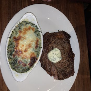 Stoney River - Ribeye with creamed spinach - Steakhouses Near Me - Annapolis, Maryland