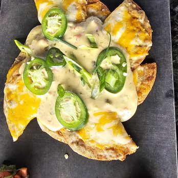 Topgolf - A very small order of nachos. - Golf Near Me - Bridgeville, Pennsylvania Topgolf - A very small order of nachos. - Golf Near Me - Bridgeville, Pennsylvania