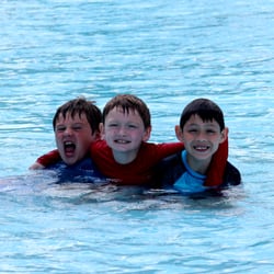 Oasis Summer Day Camp - Cooling down in the pool with friends.