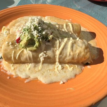 El Cholo - Enchiladas Mariscos with Lobster, Scallops, Shrimp & Jack Cheese, topped with a tasty Chipotle Cream Sauce - Mexican Near Me - Newport Beach, California El Cholo - Enchiladas Mariscos with Lobster, Scallops, Shrimp & Jack Cheese, topped with a tasty Chipotle Cream Sauce - Mexican Near Me - Newport Beach, California
