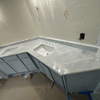 Family Home Tile and Stone - Removal of old mirrors, and installation of new marble countertop - General Contractors Near Me Family Home Tile and Stone - Removal of old mirrors, and installation of new marble countertop - General Contractors Near Me
