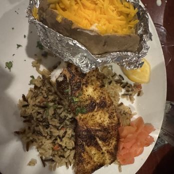 Pelican's - Chilean sea bass with a fresh perfectly prepared baked potato! - Steakhouses Near Me - Wichita Falls, Texas Pelican's - Chilean sea bass with a fresh perfectly prepared baked potato! - Steakhouses Near Me - Wichita Falls, Texas