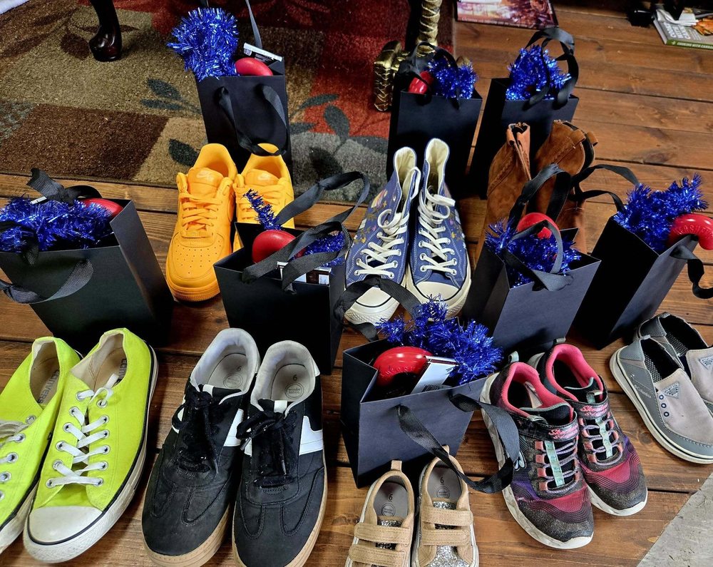 The Shire Bookstore Logo