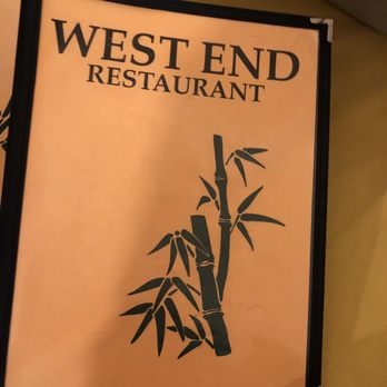 West End Restaurant - a hand holding a menu - Imported Food Near Me - Prince Rupert, British Columbia West End Restaurant - a hand holding a menu - Imported Food Near Me - Prince Rupert, British Columbia