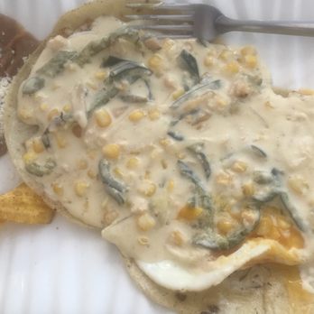 Restaurante Mar Celeste - Huevos Poblanos with a white cream sauce including corn and served over fresh corn tortillas. Yum. Best item on the breakfast menu. - Mexican Near Me - Manzanillo, COL