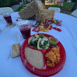 Omg Birria - Carne asada plate with rice, beans, a lemon bar and Jamaica to drink