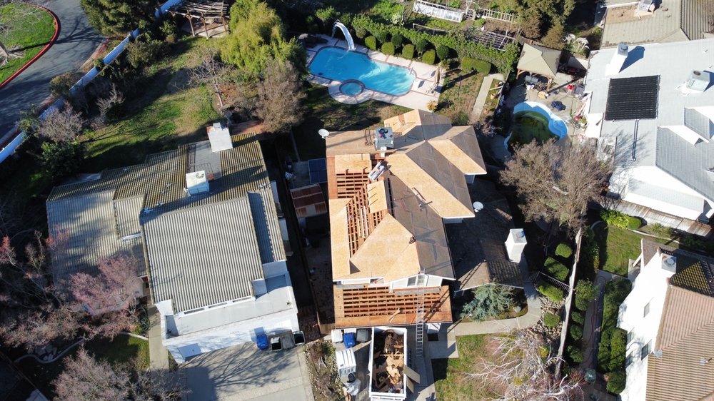 Slide of Legend Roofing Company