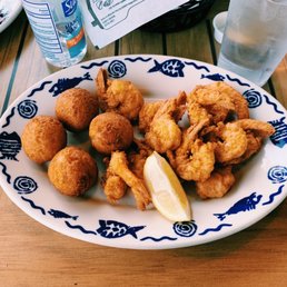 The fried shrimp basket w/ hush puppies The fried shrimp basket w/ hush puppies