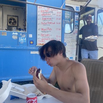 Joes Backyard Bbq Lunchwagon - Jo and the menu items featured behind my hungry son . - Food Trucks Near Me - Aiea, Hawaii