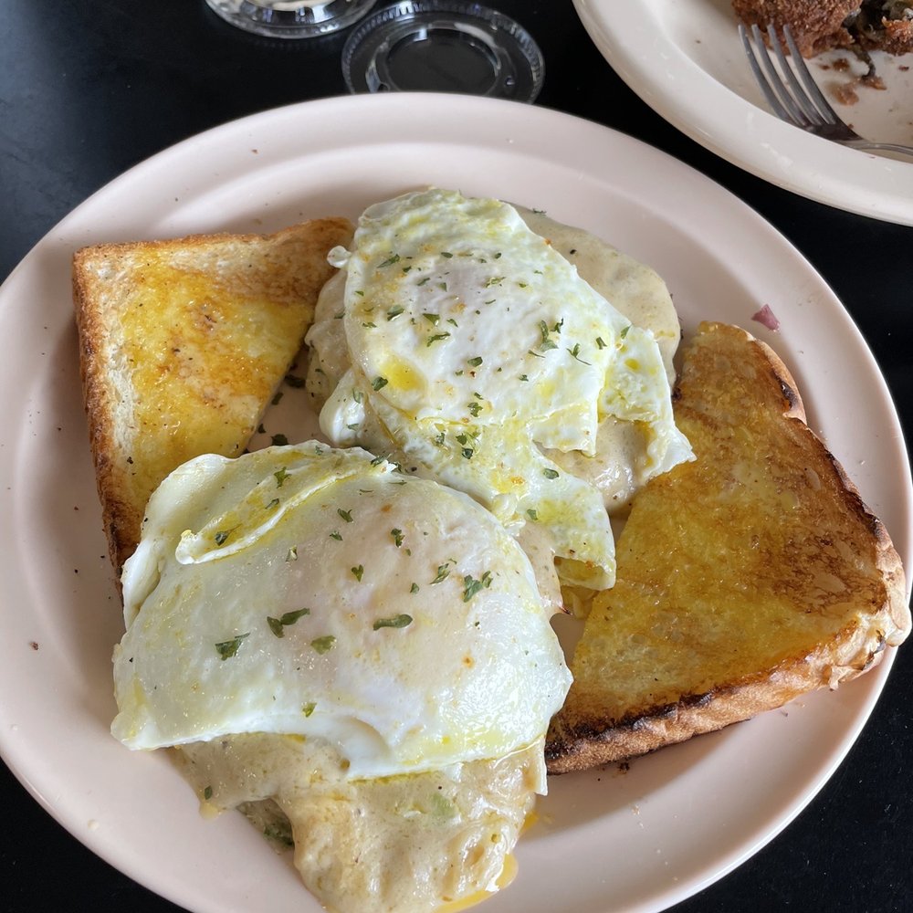Penny's Cafe - Two eggs over crab cakes was delish! - Southern Near Me - Violet, Louisiana Penny's Cafe - Two eggs over crab cakes was delish! - Southern Near Me - Violet, Louisiana
