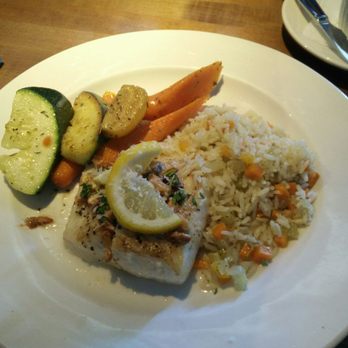 Mario's Kitchen - Pan seared halibut with cashew butter, served with sides of roasted veggies and rice pilaf - Pizza Near Me - Delta, British Columbia Mario's Kitchen - Pan seared halibut with cashew butter, served with sides of roasted veggies and rice pilaf - Pizza Near Me - Delta, British Columbia