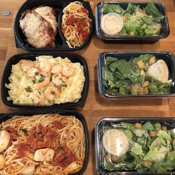 Carrabba's Italian Grill - Chicken Parmesan up top, Shrimp Fettuccine, and Shrimp and Scallops at the bottom. - Italian Near Me - Morrow, Georgia