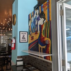 Neat mural by the trash just inside the front entrance