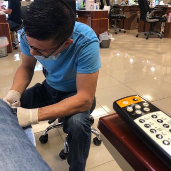 Posh Nail Bar - Nail technicians working hard! Wearing their masks! Plexiglass is up on stations to protect both customer and technician! Great job! - Nail Salons Near Me - Tyler, Texas