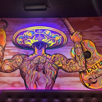 Exit 12 Bar - a mural of a man with a sombren and a guitar - Mexican Near Me - Carteret, New Jersey