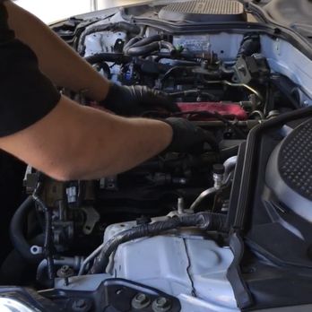 Grease Monkey Garage - Removing the valve cover - Auto Repair Near Me - El Cajon, California Grease Monkey Garage - Removing the valve cover - Auto Repair Near Me - El Cajon, California